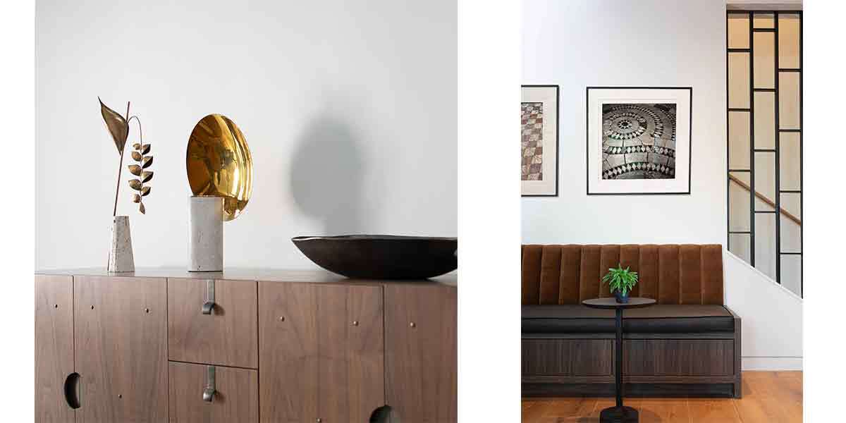 Stylish modern interior with decorative vases and a black bowl on a wooden sideboard.