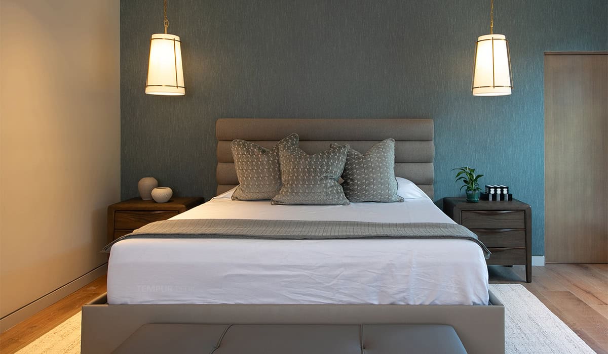 Contemporary bedroom with stylish decor and soft lighting for a relaxing ambiance.